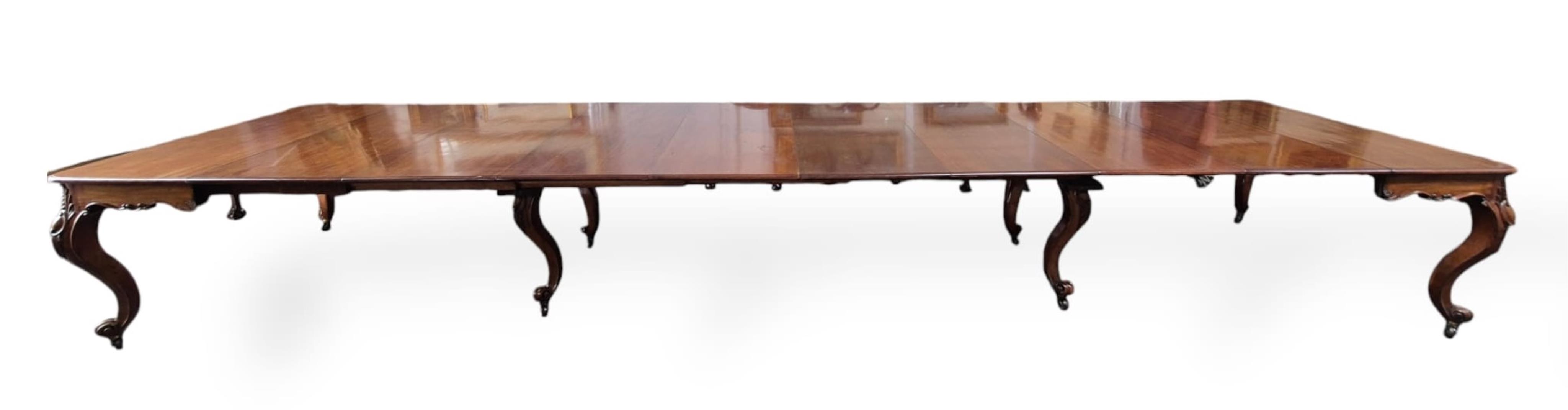 An unusually large William IV mahogany extending dining table